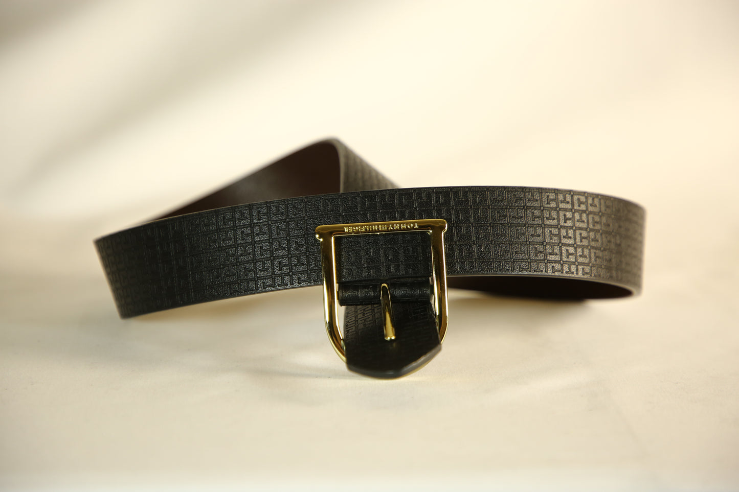 Tommy Hilfiger Black Monogram Engrave Belt with a Gold buckle