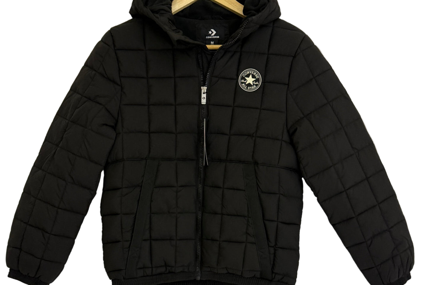 Black quilted jacket with the Converse brand logo