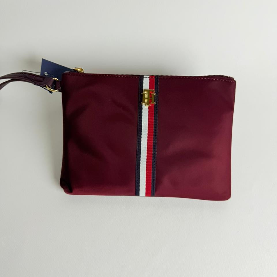 Discover the Tommy Hilfiger Burgundy Pouch/Wallet.