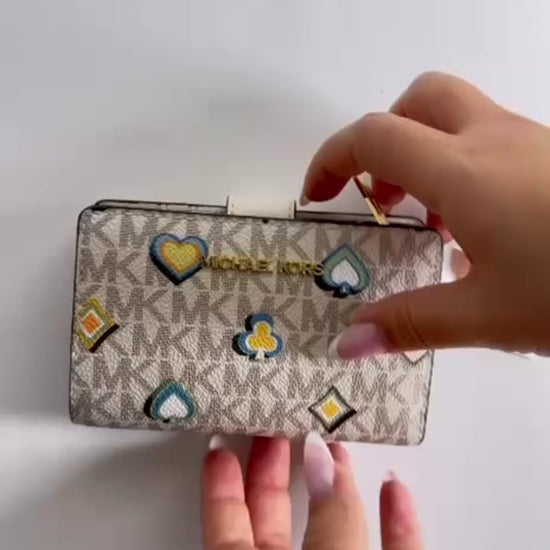 video of Michael Kors Jet Set Medium Printed Signature Logo Wallet
