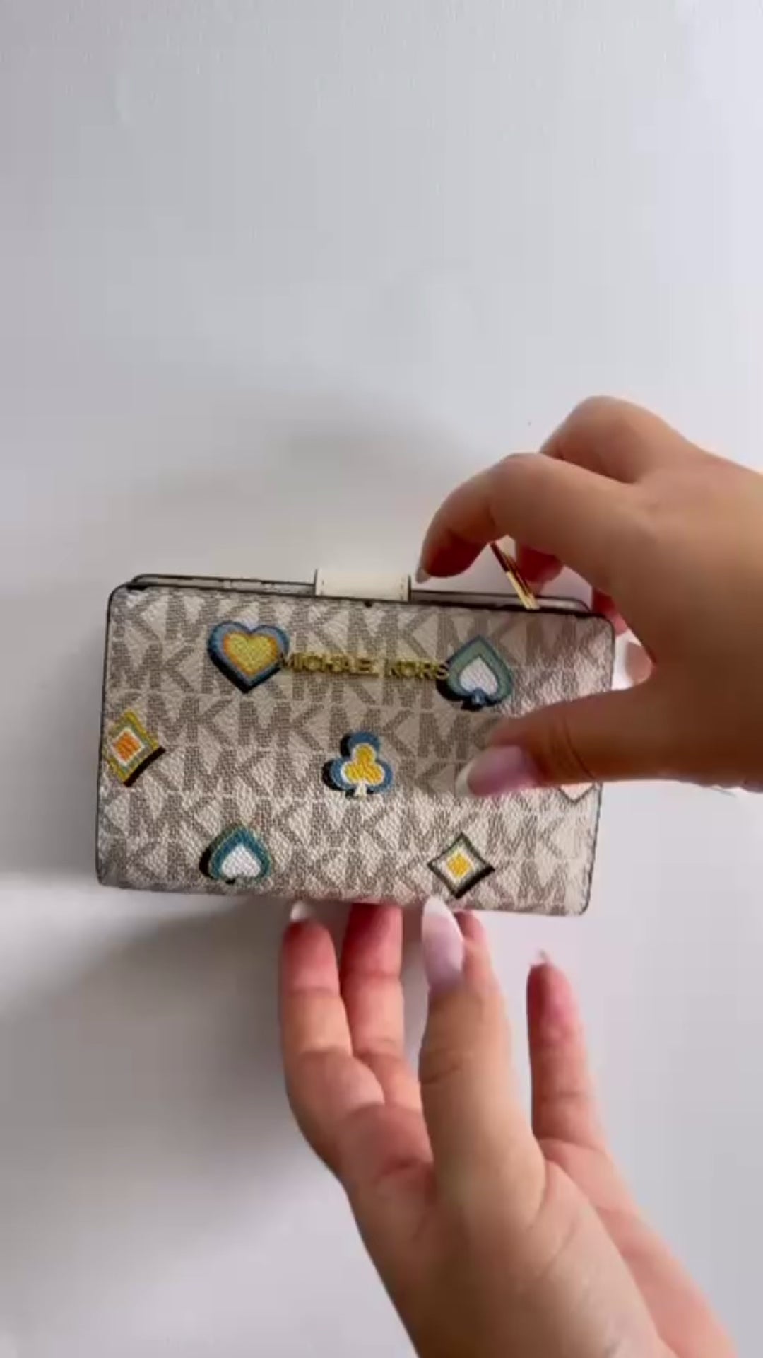 video of Michael Kors Jet Set Medium Printed Signature Logo Wallet